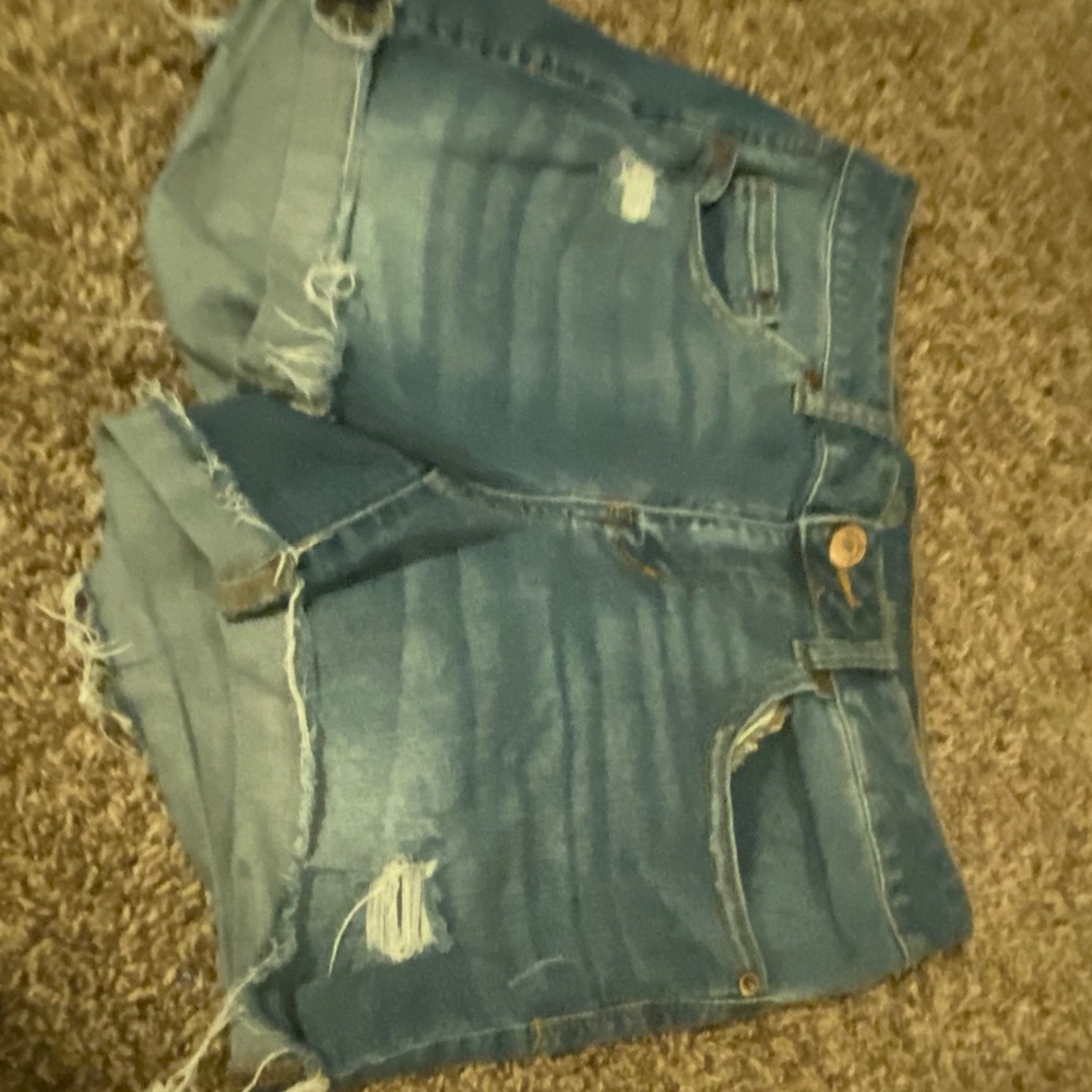 Blue ripped shorts